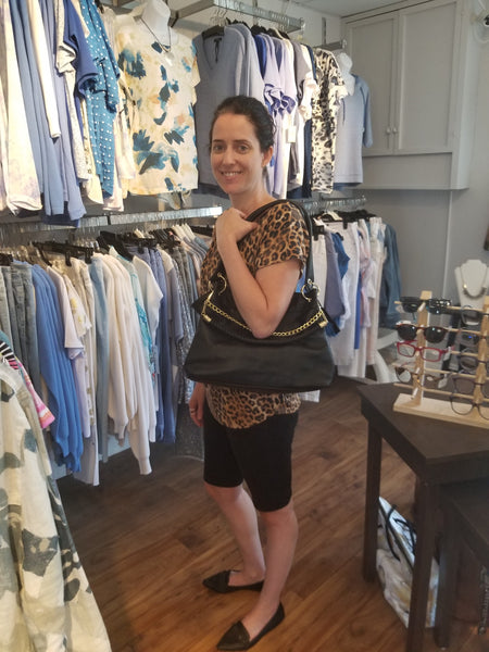 Looking For A New Purse or Clutch?