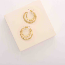 Load image into Gallery viewer, Merx Fashion Looped Textured Hoop Earring in Silver or Gold
