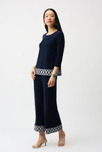 Load image into Gallery viewer, Silky Knit Fitted Top With Guipure Hem Detail
